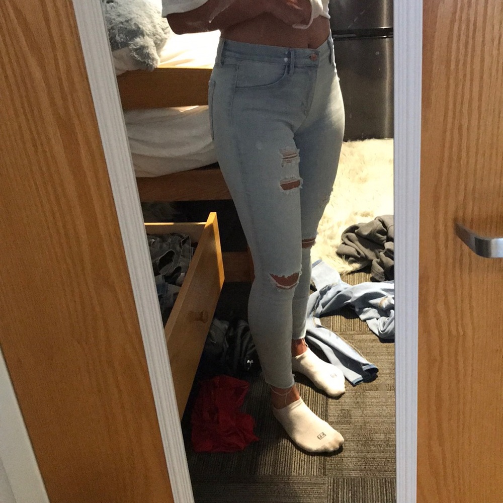 Light blue ripped jeans